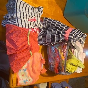 Bundle. Six month and 6-9 dresses. Tops pants variety two sleep sacks too.